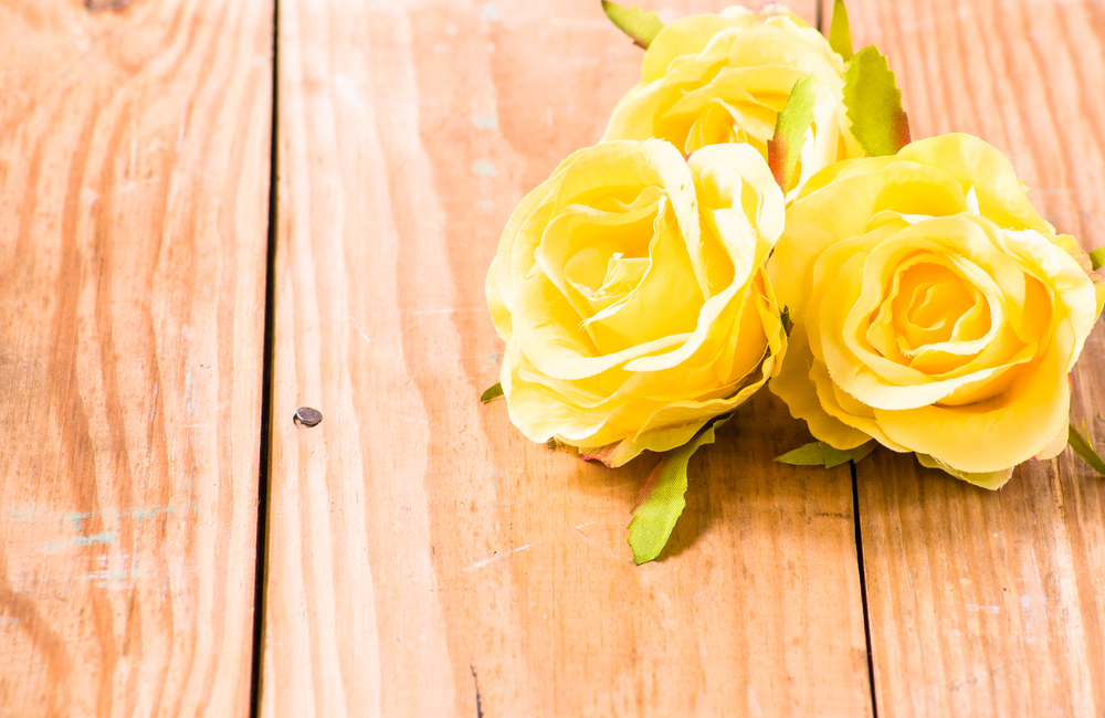 Friends holding hands showing support.