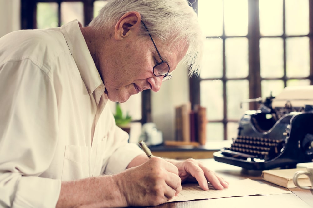 Man Helping Woman Hiking