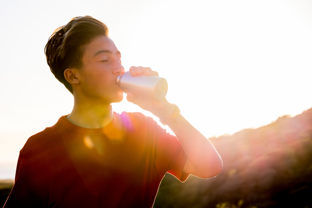 Friends holding hands showing support.